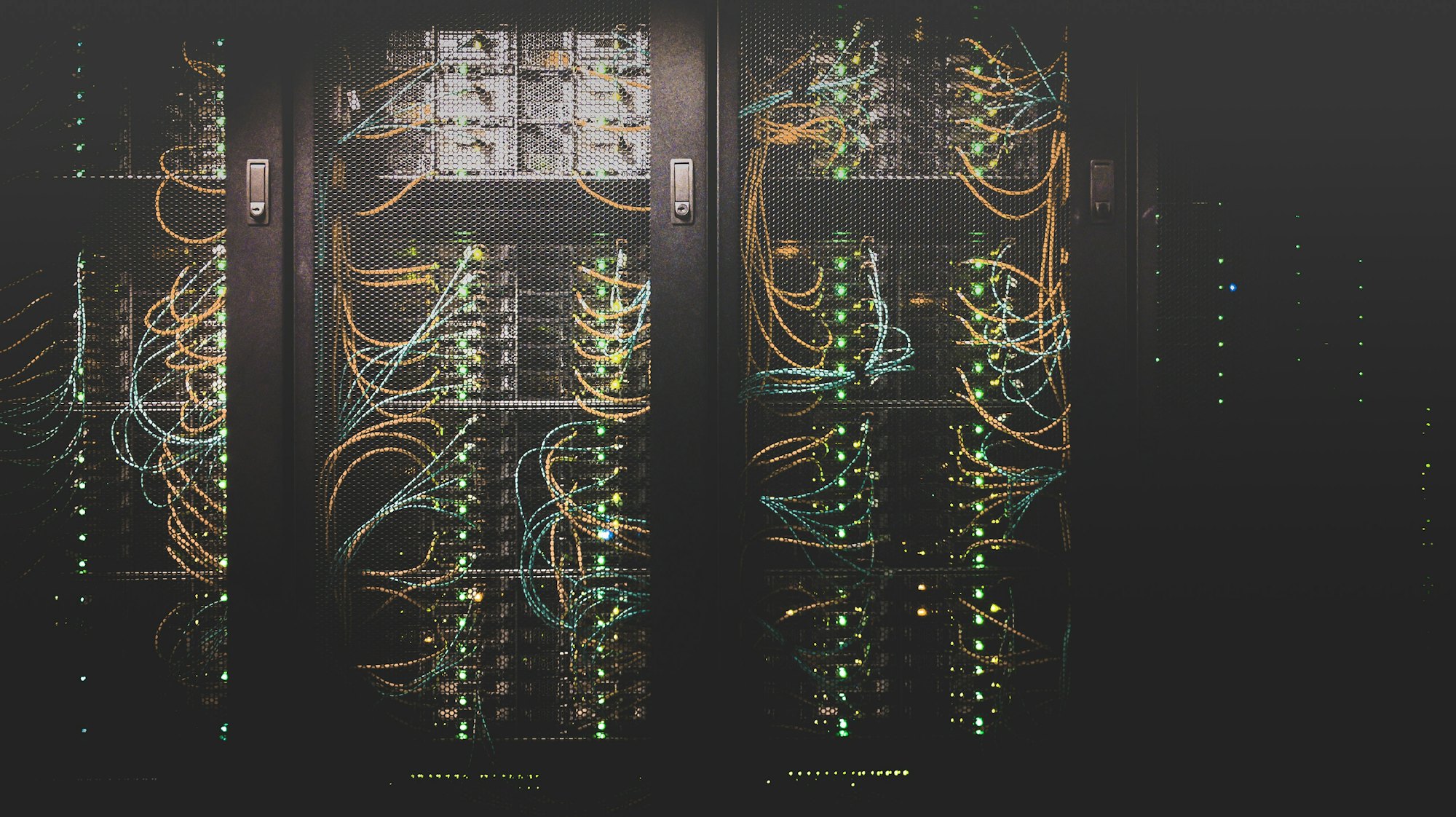 Rows of structured network cabling in a data centre